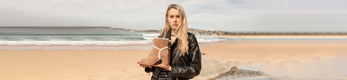 Sheepskin Uggs With Outside Stitching